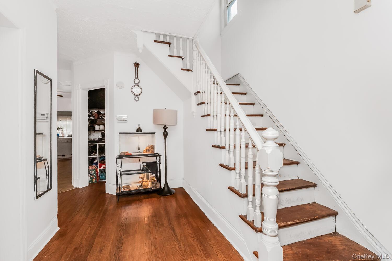 32 Alexander Avenue Yonkers, NY 10704 - Photo 13 of 16 a view of entryway and hall with wooden floor