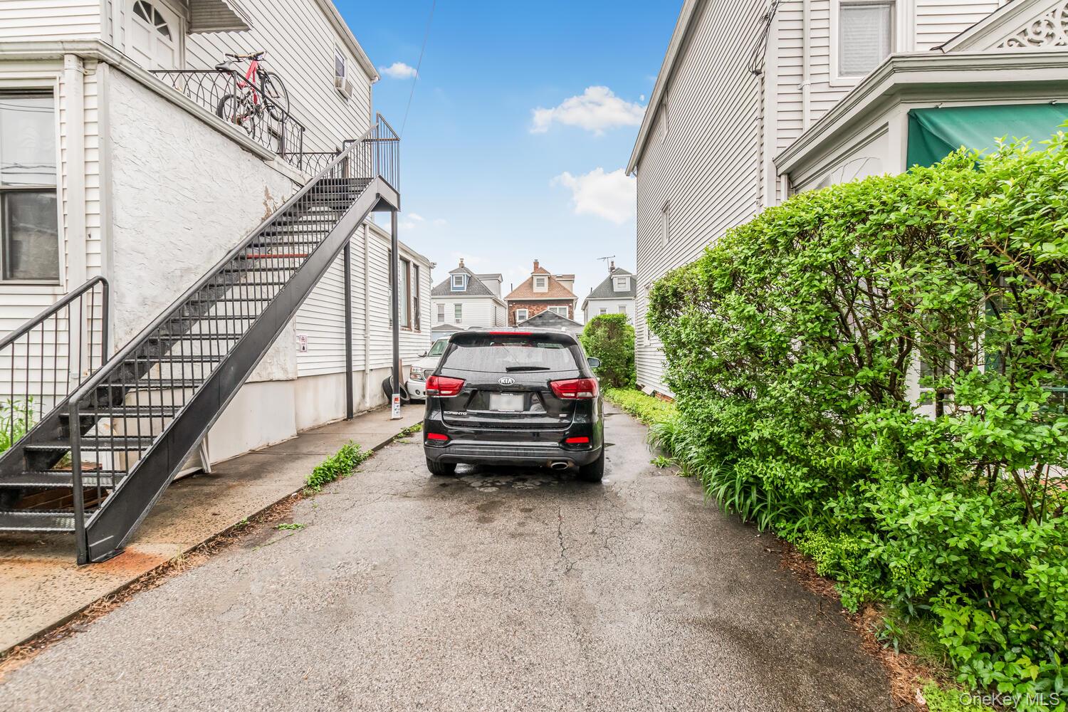32 Alexander Avenue Yonkers, NY 10704 - Photo 16 of 16 a view of a yard in front of a house