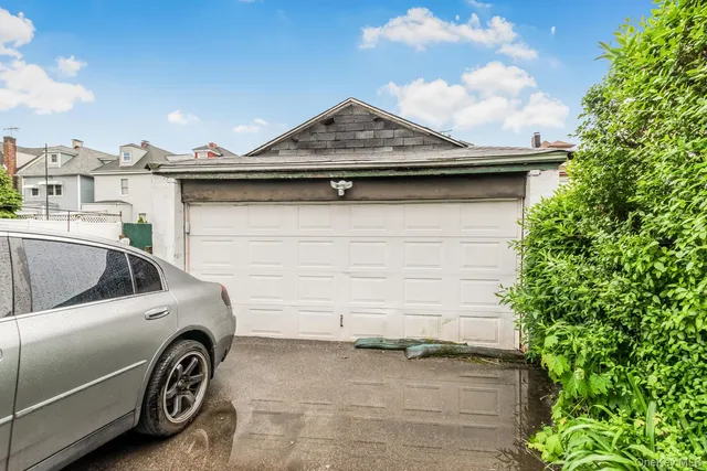a car parked in front of a house