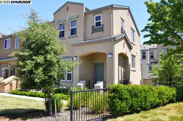 8905 San Ramon Road Dublin, CA 94568 - Photo 1 of 1 a front view of a house with a garden