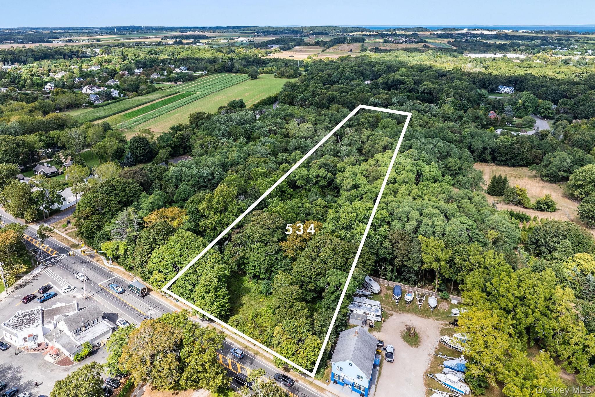 534 Main Road Aquebogue, NY 11901 - Photo 6 of 6 Aerial overview of property's location featuring property boundaries highlighted