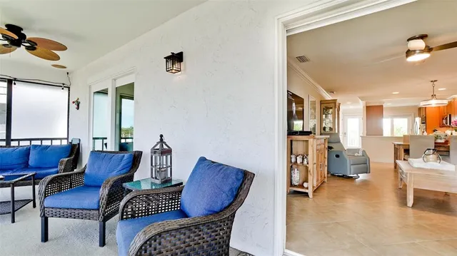 a view of balcony with furniture