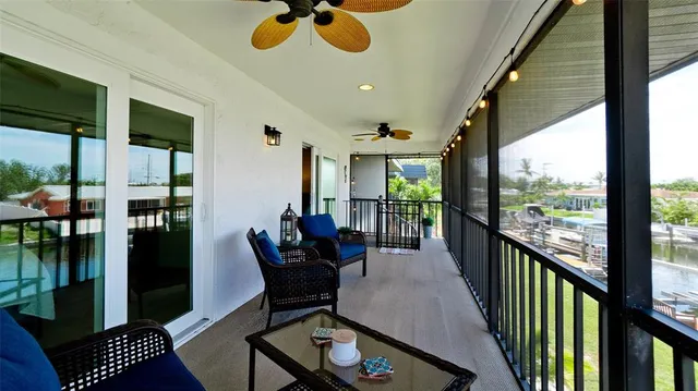 a view of living room with furniture and entryway