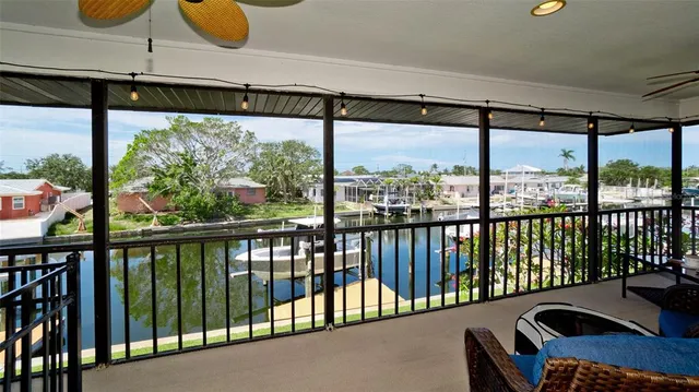 a view of a living room with bathroom