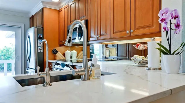 a view of a door and a window