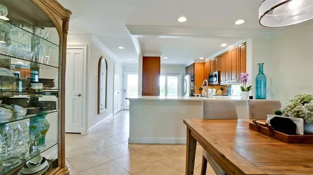 a spacious bedroom with a large bed and a dresser