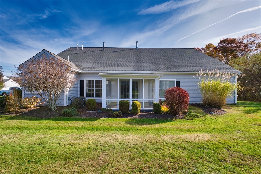 8 Village Way, Unit 8 Westport, MA 02790 - Photo 3 of 29 a view of a house with backyard and sitting area