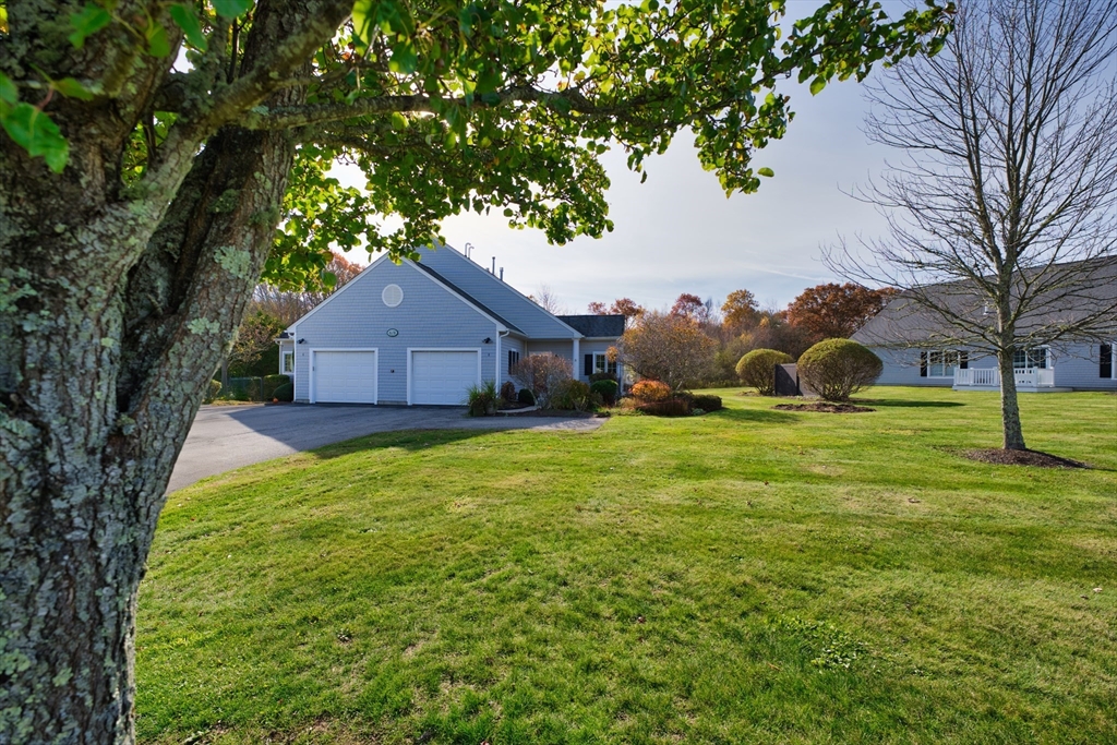 8 Village Way, Unit 8 Westport, MA 02790 - Photo 7 of 29 a house view with garden space