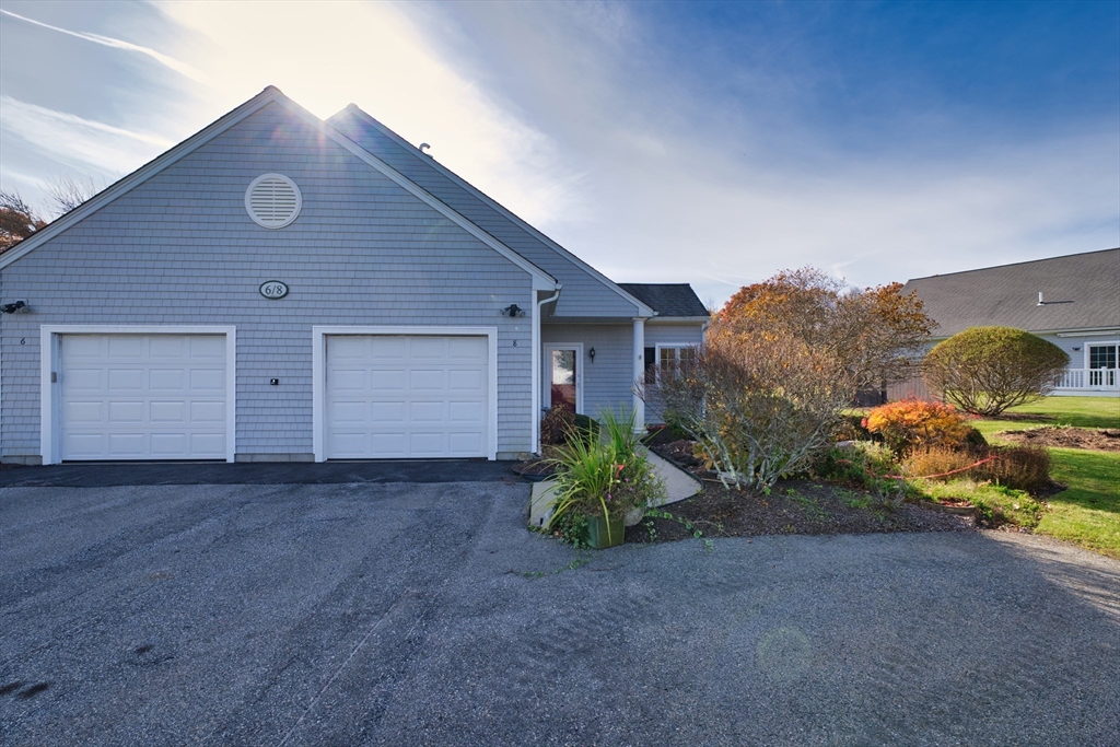 8 Village Way, Unit 8 Westport, MA 02790 - Photo 8 of 29 a front view of a house with garden