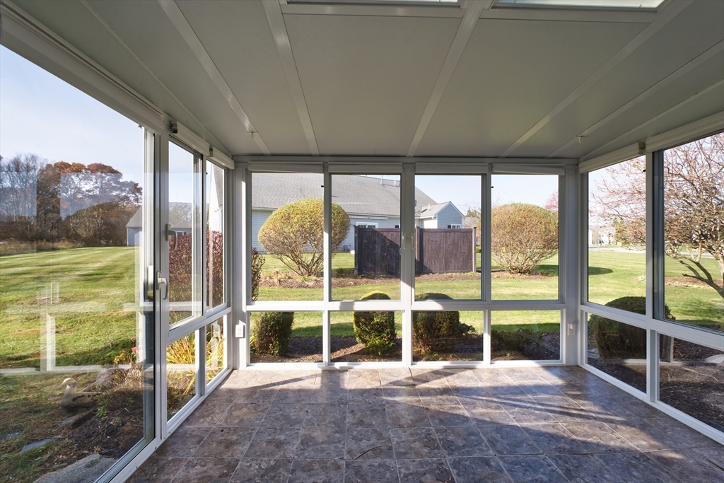 8 Village Way, Unit 8 Westport, MA 02790 - Photo 9 of 29 a view of a large window with an outdoor space