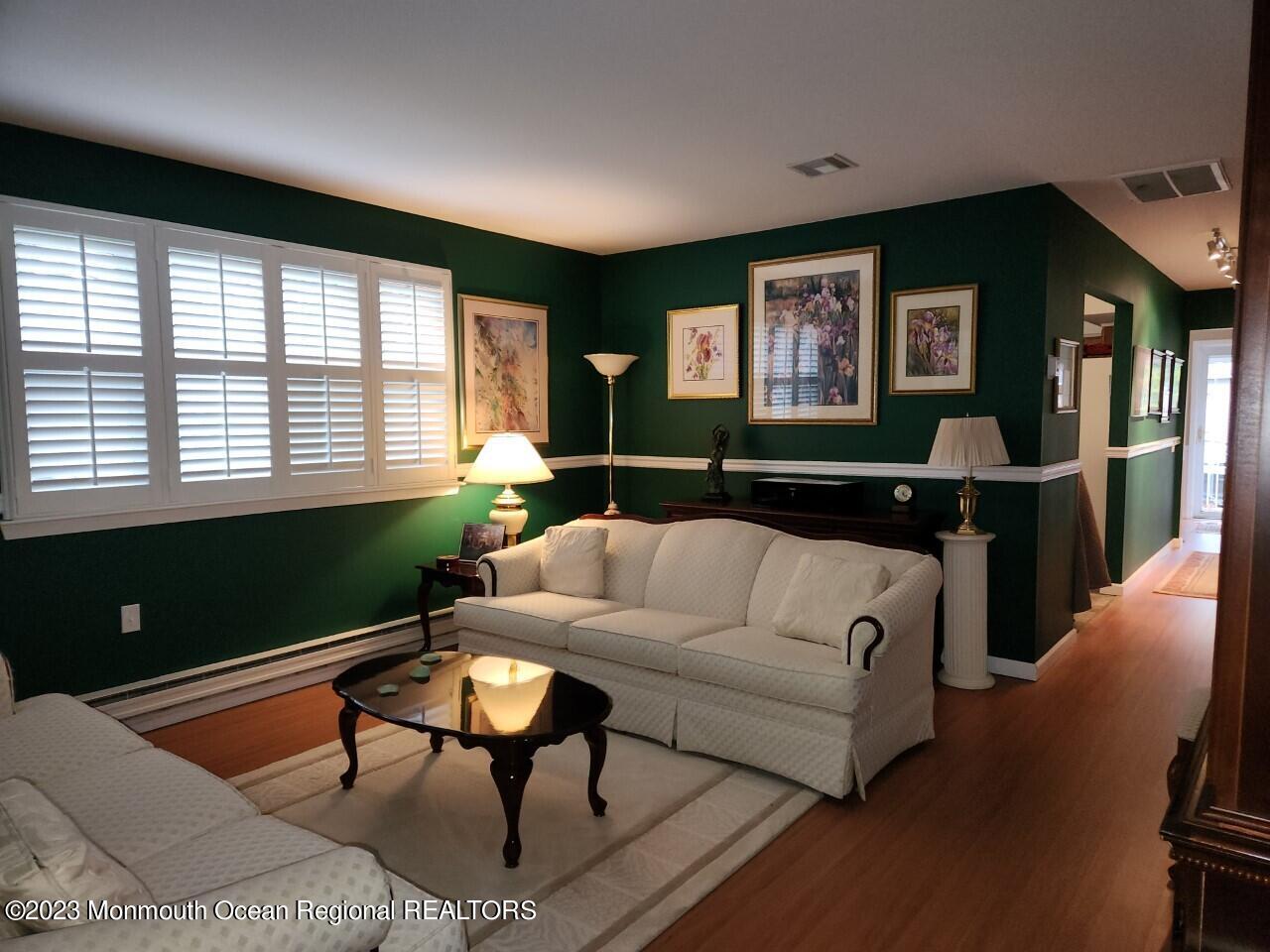 21 B Medford Road Whiting, NJ 08759 - Photo 7 of 21 a living room with furniture a window and a flat screen tv