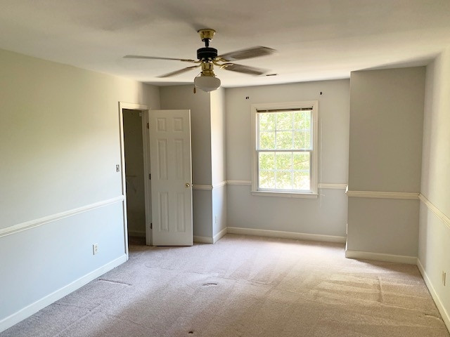 4529 Birmingham Way Raleigh, NC 27604 - Photo 14 of 26 Spacious second floor master suite easily fits a king sized bed and features a ceiling fan and chair rail moldings. Master Bedroom