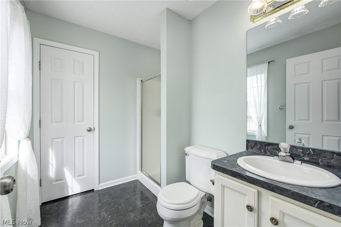33990 Harding Avenue North Ridgeville, OH 44039 - Photo 22 of 37 Ensuite with stall shower and large linen closet