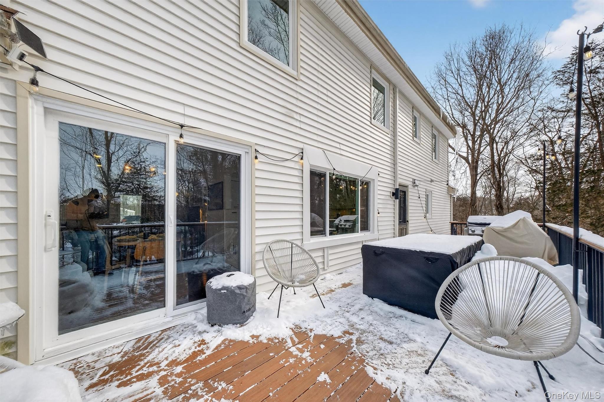 5 Larch Court Poughkeepsie, NY 12603 - Photo 38 of 41 Fiberon Composite Back Deck with Westbury Metal Railings off of Dining Area.