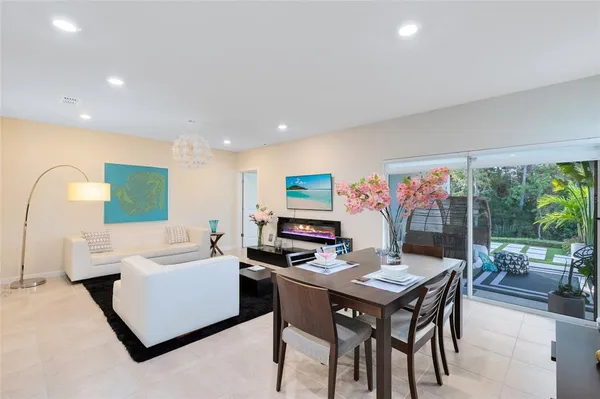 a view of a dining room with furniture window and outside view