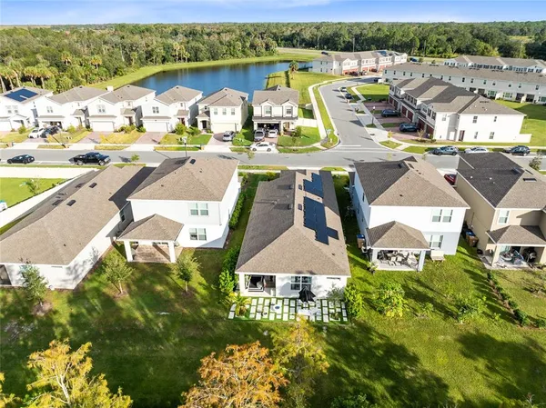 an aerial view of a house with a garden