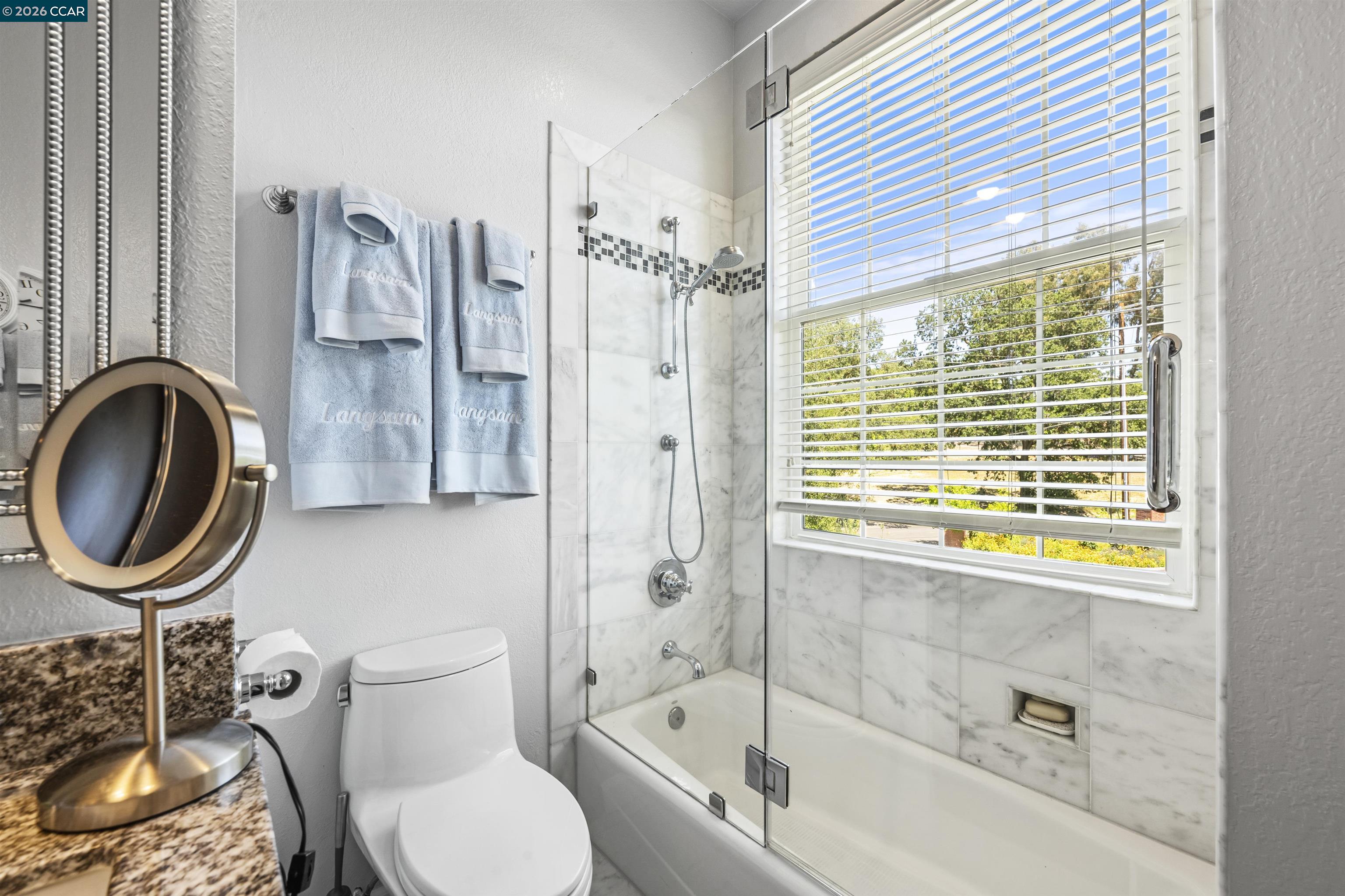 177 Oak Road Alamo, CA 94507 - Photo 27 of 85 a bathroom with a sink a toilet and shower