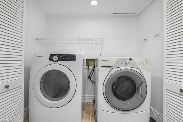 a utility room with dryer and washer