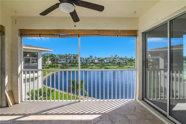 a view of a building with a table and chairs