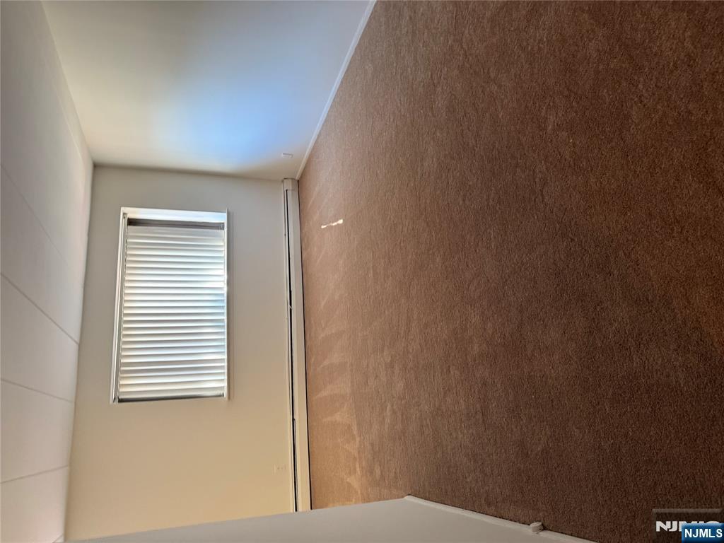 873 Main Street, Unit 2C Hackensack, NJ 07601 - Photo 7 of 11 a view of an empty room