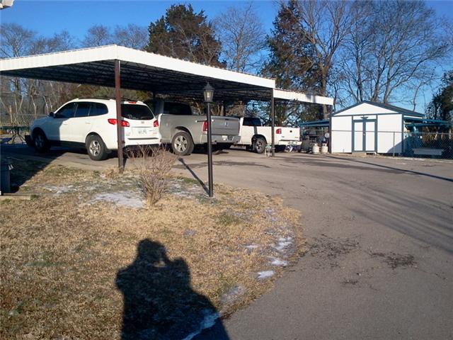 5061 Linwood Road Watertown, TN 37184 - Photo 7 of 20 3 CAR CARPORT WITH BLACKTOP DRIVEWAY