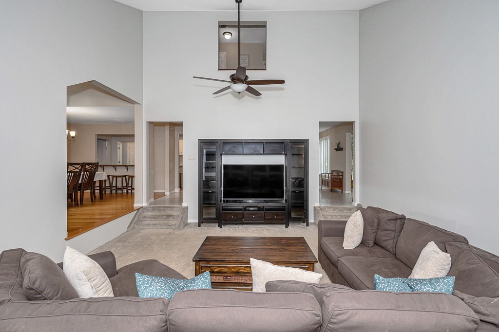 18 Fairview Farm Road Haverhill, MA 01832 - Photo 13 of 42 a living room with furniture and a fireplace