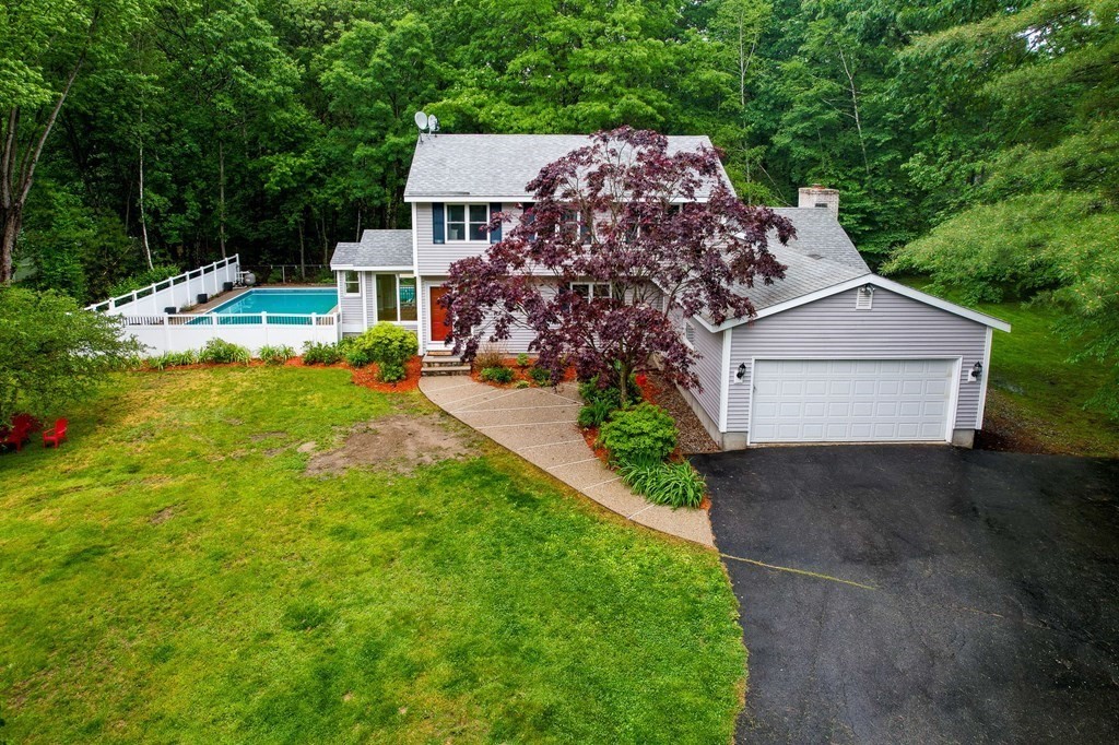 18 Fairview Farm Road Haverhill, MA 01832 - Photo 3 of 42 a house view with a garden space