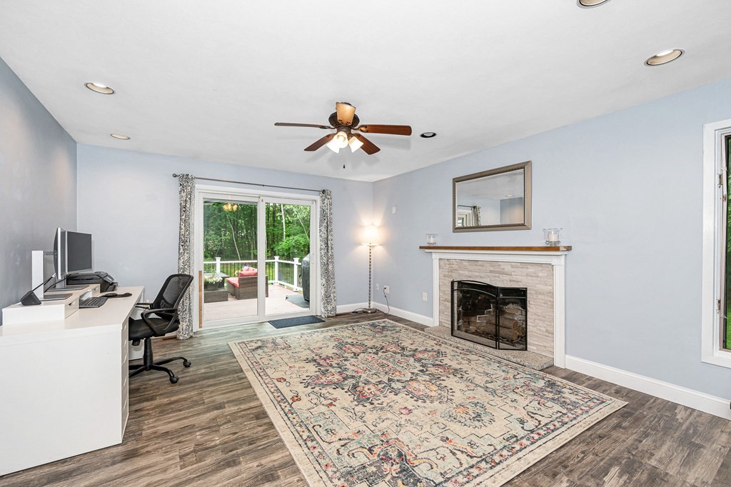 18 Fairview Farm Road Haverhill, MA 01832 - Photo 7 of 42 a living room with furniture and a fireplace