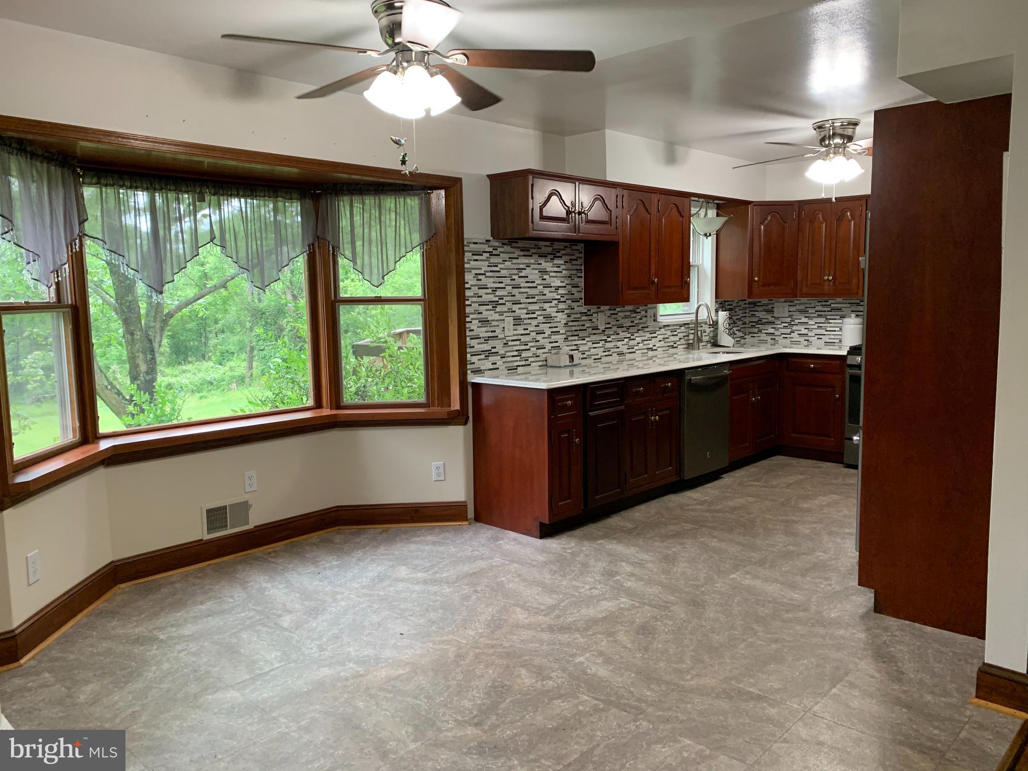 Eat in kitchen with large bay window