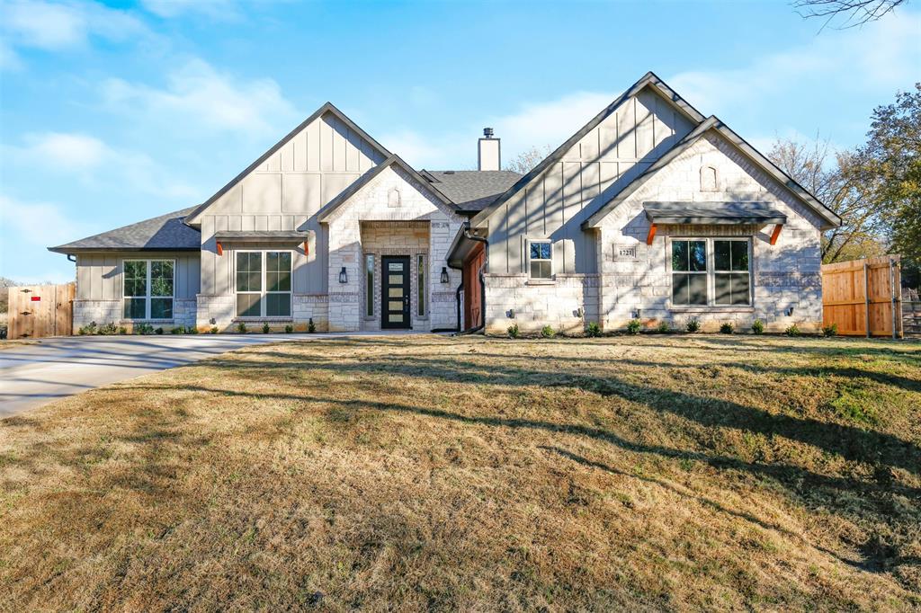 1721 Bonner Mansfield, TX 76063 - Photo 1 of 1 a front view of a house with a yard