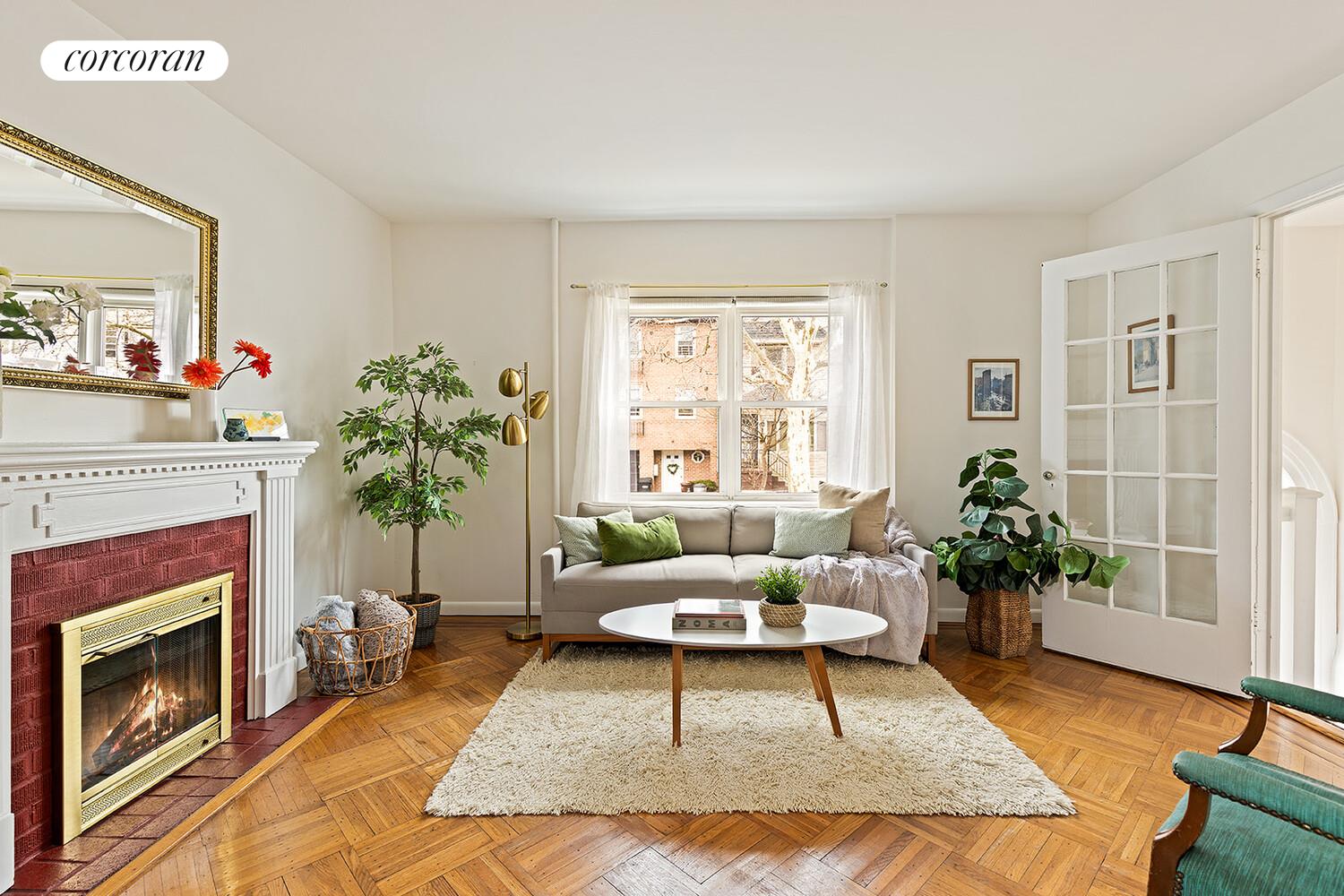 326 97th Street Brooklyn, NY 11209 - Photo 1 of 10 a living room with furniture and a fireplace