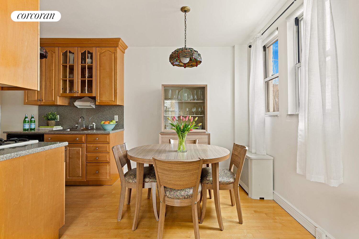 326 97th Street Brooklyn, NY 11209 - Photo 2 of 10 a dining room with furniture and window