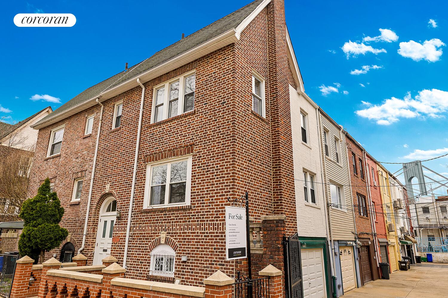 326 97th Street Brooklyn, NY 11209 - Photo 7 of 10 a front view of a house with a yard