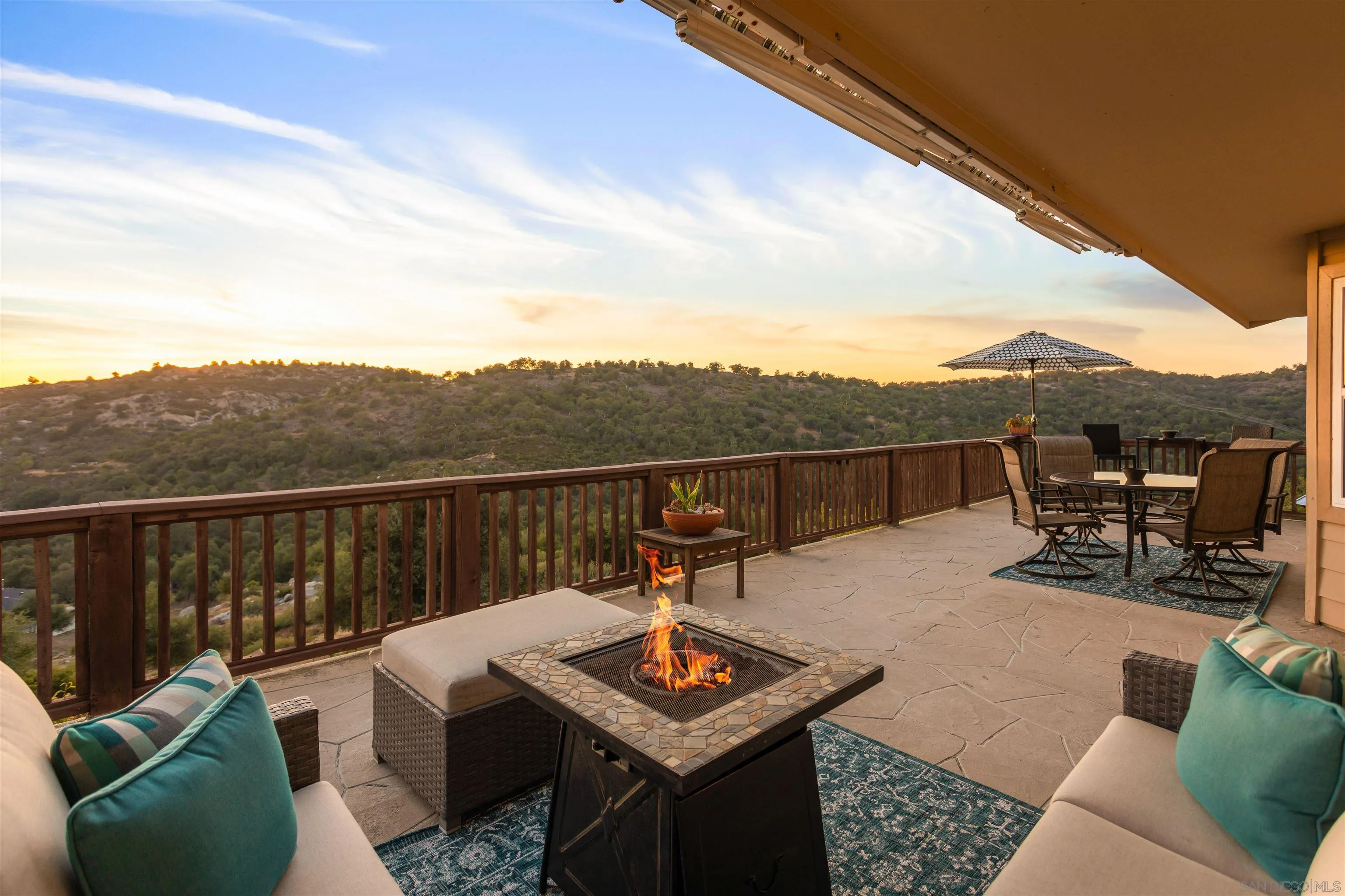 a terrace of a house with couches table and chairs