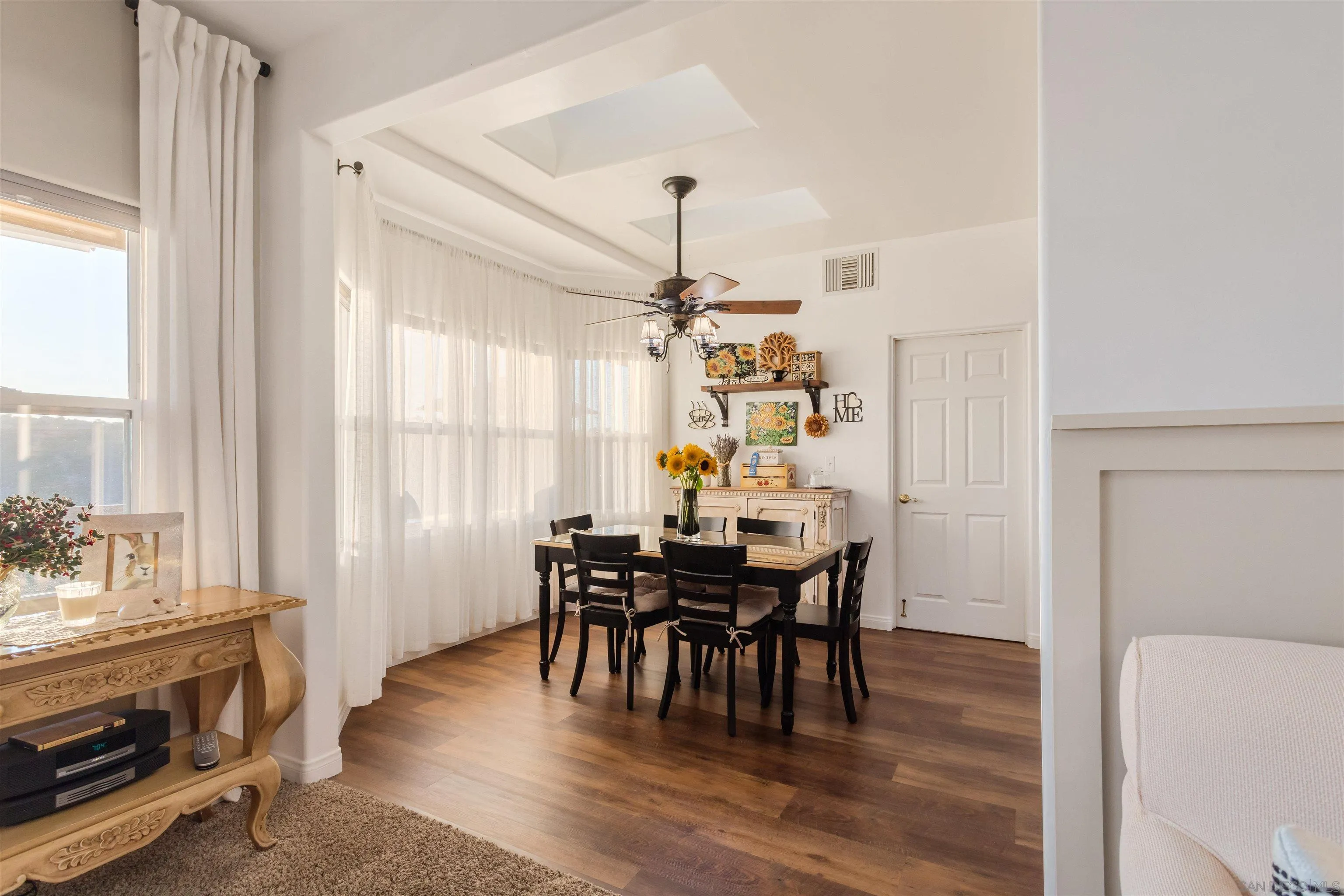 1210 Lakedale Road Santa Ysabel, CA 92070 - Photo 22 of 67 a view of a dining room with furniture window and wooden floor