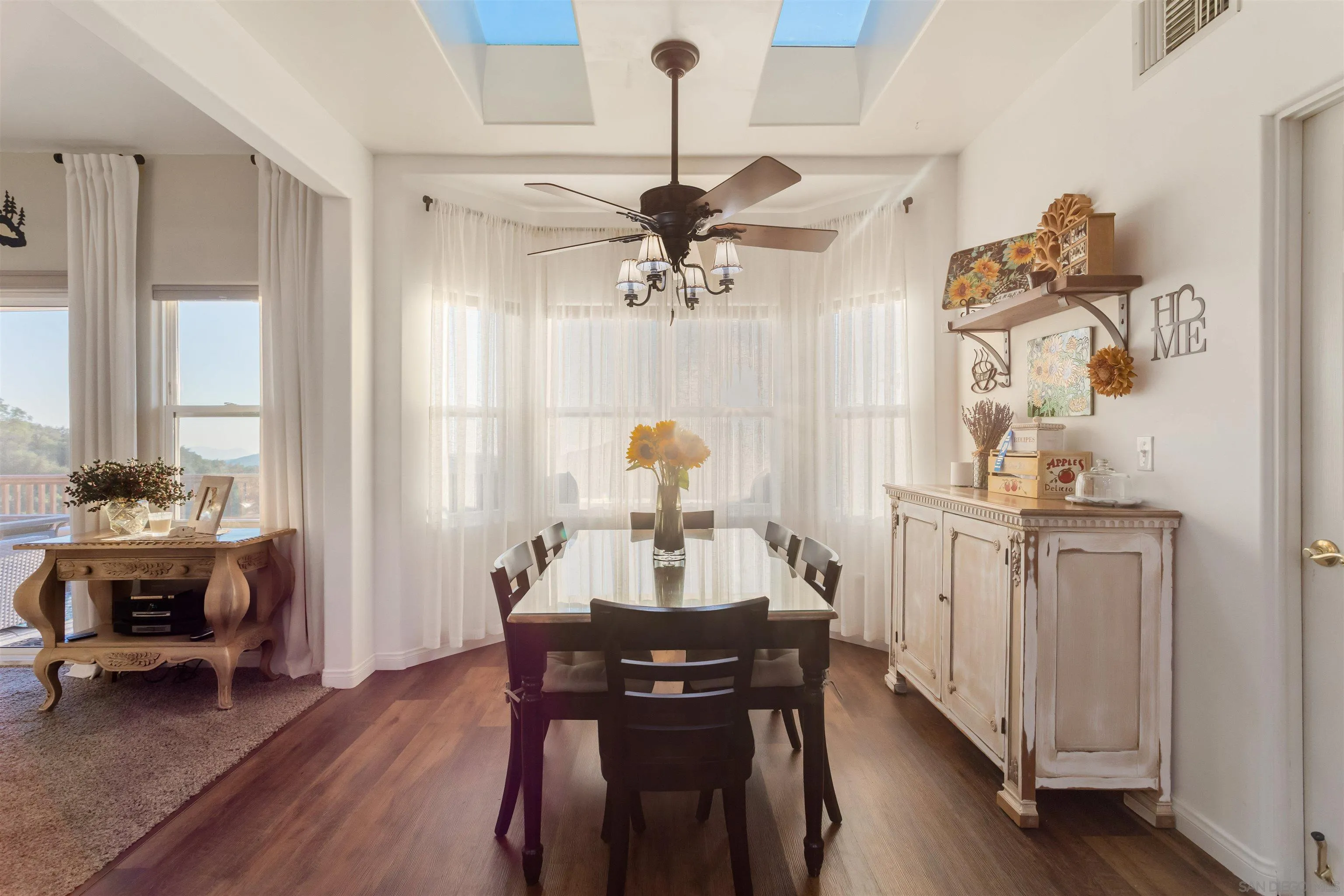 1210 Lakedale Road Santa Ysabel, CA 92070 - Photo 23 of 67 a view of a dining room with furniture window and wooden floor