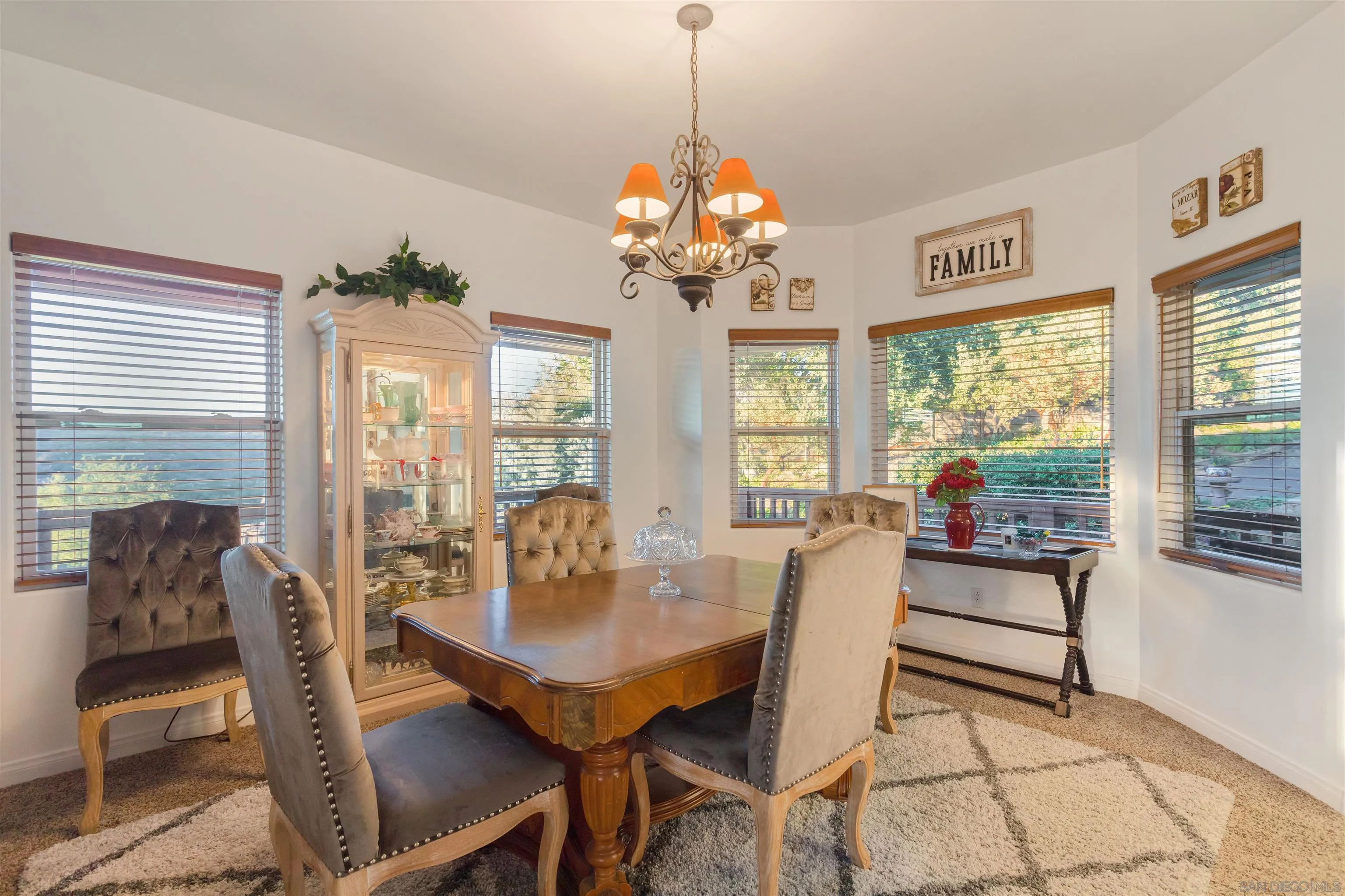 1210 Lakedale Road Santa Ysabel, CA 92070 - Photo 25 of 67 a dining room with furniture a chandelier and window