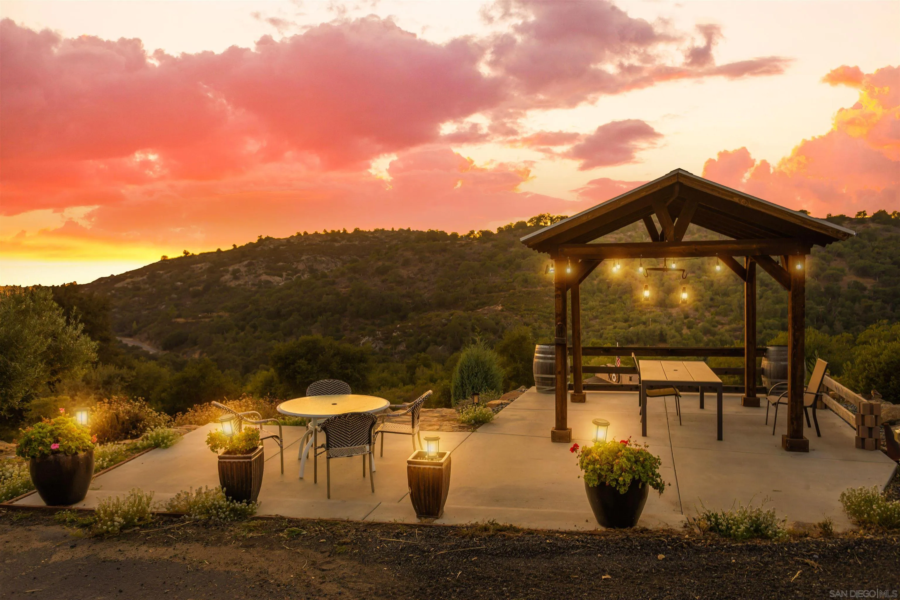 1210 Lakedale Road Santa Ysabel, CA 92070 - Photo 47 of 67 a view of a patio with table and chairs and potted plants