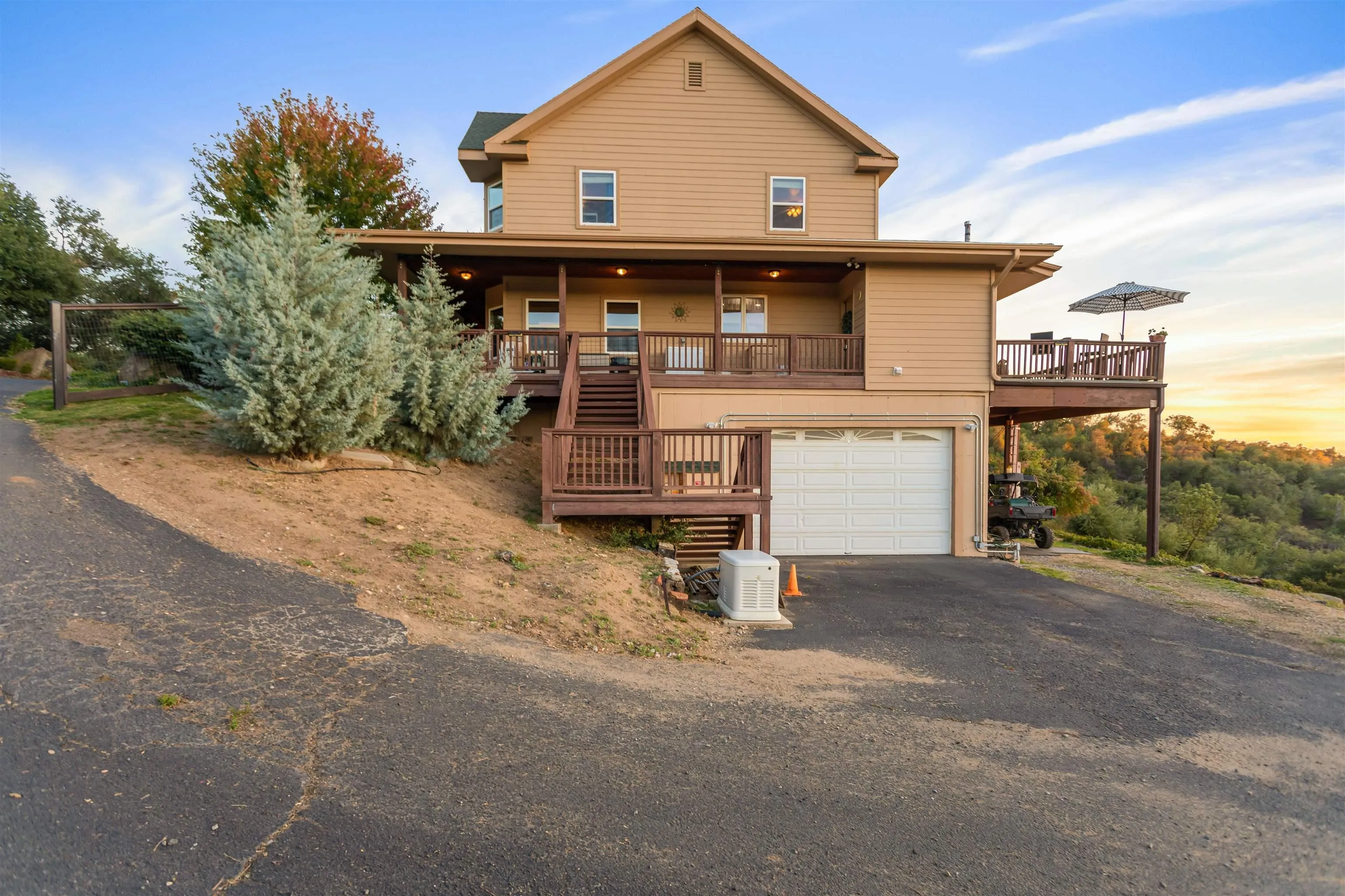 1210 Lakedale Road Santa Ysabel, CA 92070 - Photo 49 of 67 a front view of a house with a garden and parking