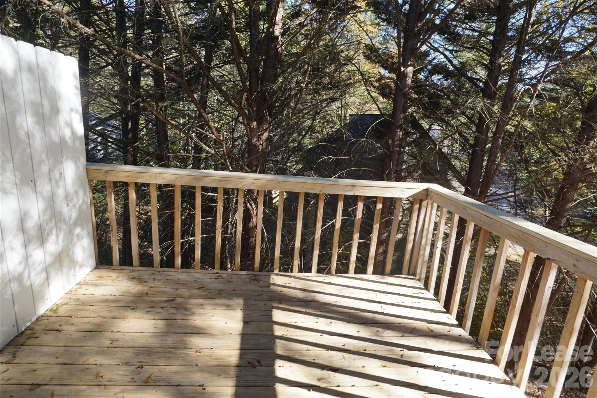 1950 4th Street Northeast, Unit 6 Hickory, NC 28601 - Photo 2 of 8 a view of balcony with wooden floor