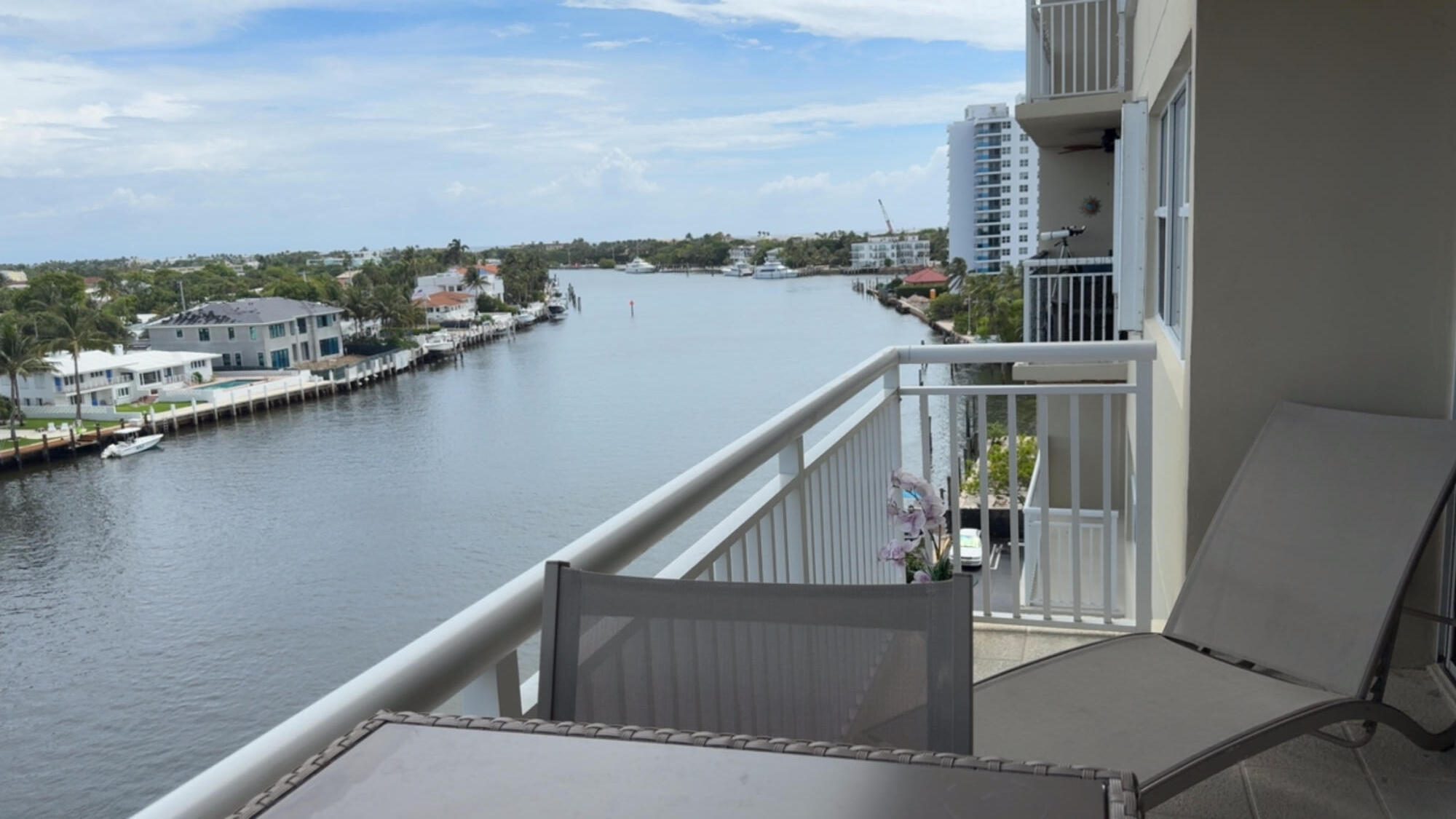 2611 North Riverside Drive, Unit 703 Pompano Beach, FL 33062 - Photo 69 of 81 a view of swimming pool with a lake from a balcony