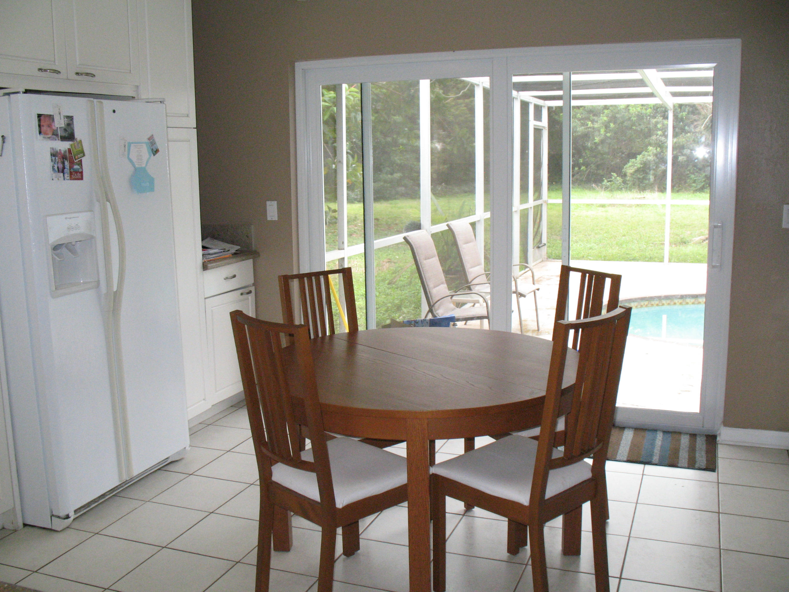 10213 Sleepy Brook Way Boca Raton, FL 33428 - Photo 7 of 15 a view of a dining room with furniture window and outside view
