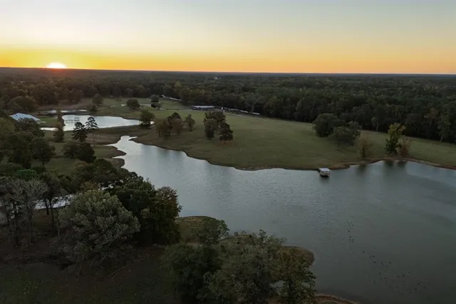 a view of a street with a building in the background