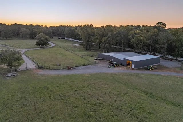 a view of a lake in middle of forest