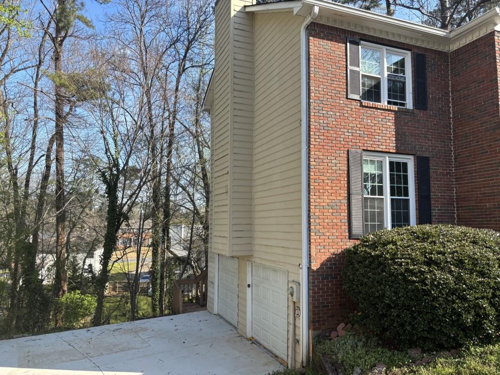 4749 Shallow Ridge Road Northeast Kennesaw, GA 30144 - Photo 25 of 28 a view of a house with a yard