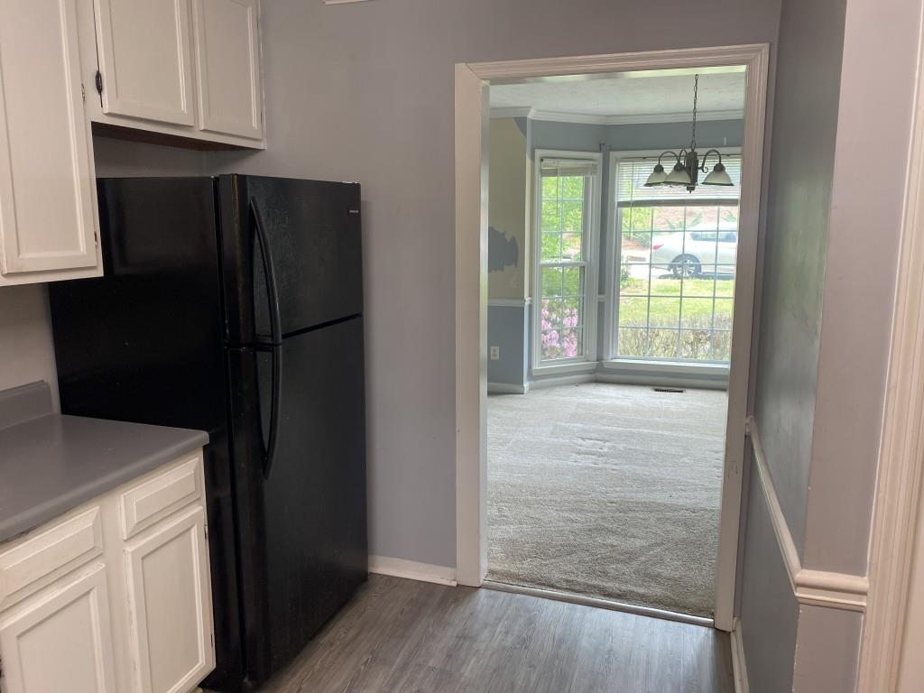 4749 Shallow Ridge Road Northeast Kennesaw, GA 30144 - Photo 10 of 28 a view of hallway with wooden floor