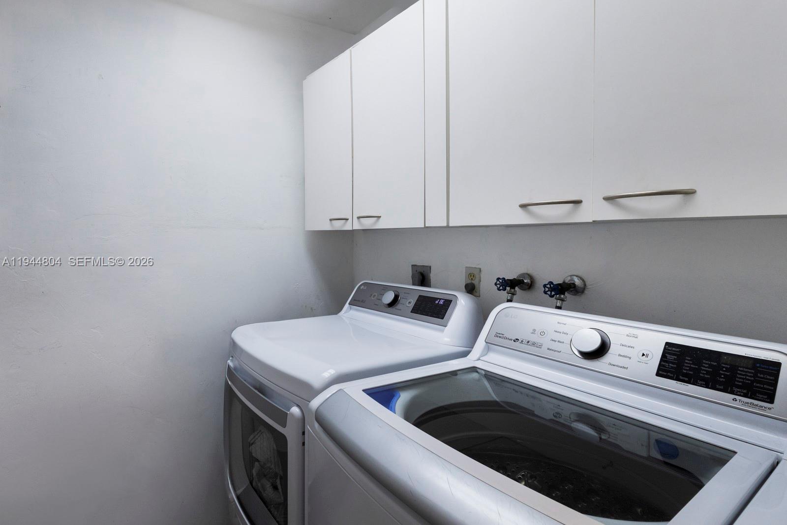 10281 Southwest 125th Street Miami, FL 33176 - Photo 16 of 45 a utility room with dryer and washer