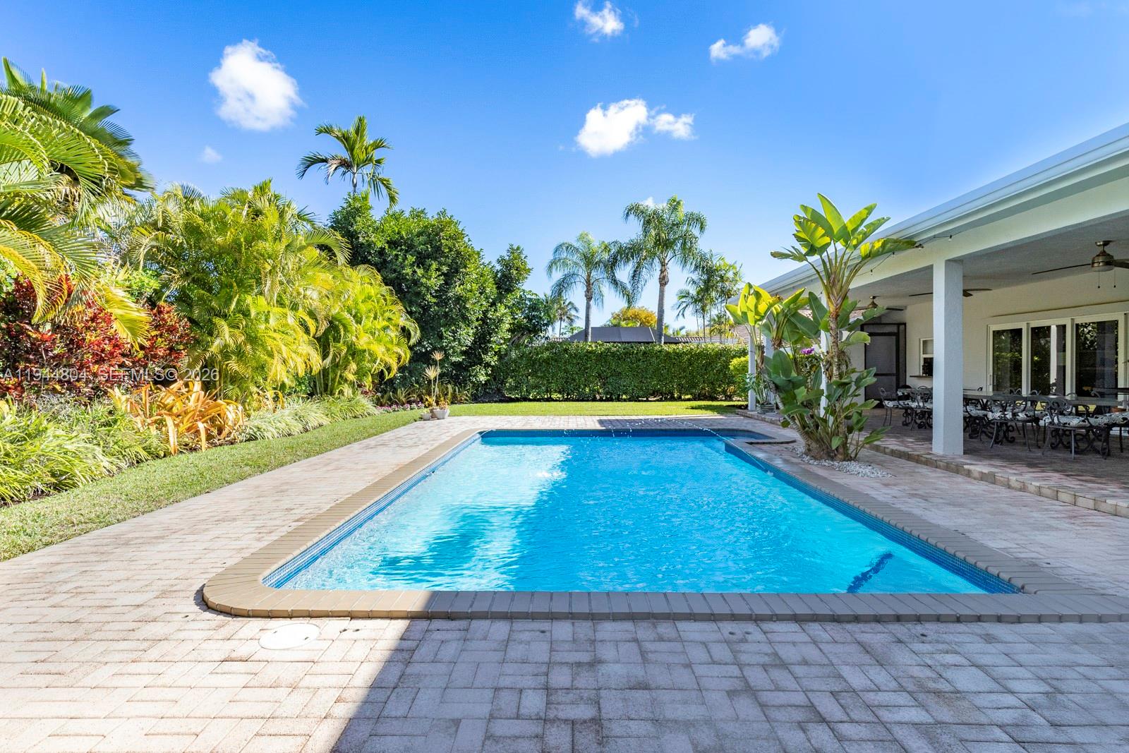 10281 Southwest 125th Street Miami, FL 33176 - Photo 18 of 45 a view of swimming pool with outdoor seating