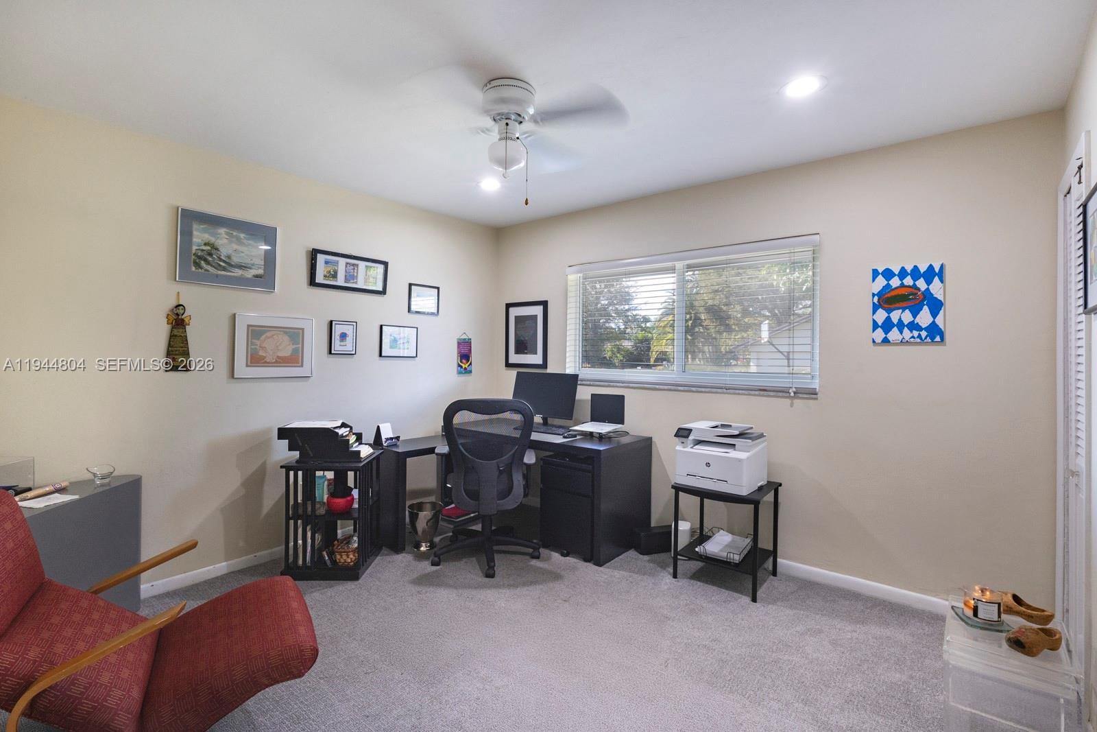 10281 Southwest 125th Street Miami, FL 33176 - Photo 30 of 45 a view of a workspace with furniture and a window
