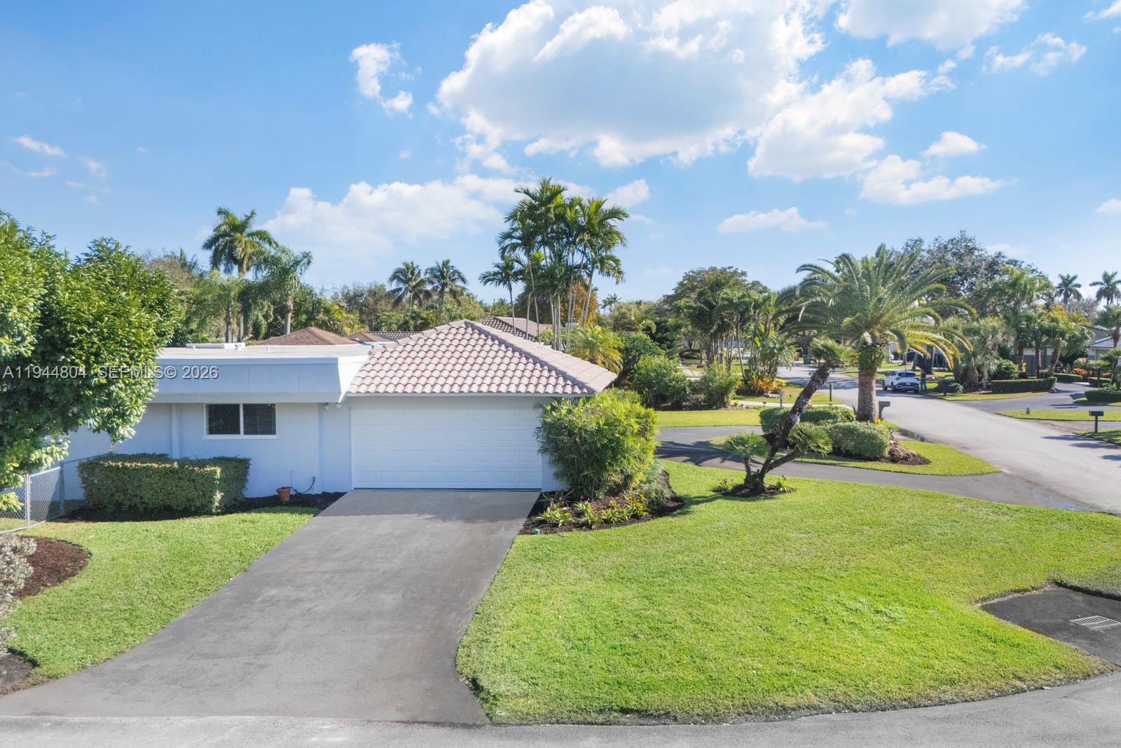 10281 Southwest 125th Street Miami, FL 33176 - Photo 40 of 45 a house view with a garden space